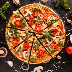 Plaque à pizza perforée en fer blanc 30 cm - Alice Délice